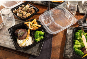 Pactiv Evergreen - 10.5 x 9.5 x 3.1" Black/Clear Vented Dual Color 3-Compartment PP Hinged Lid Container with 3-Compartment Lid, 132 Count - DC109330B00